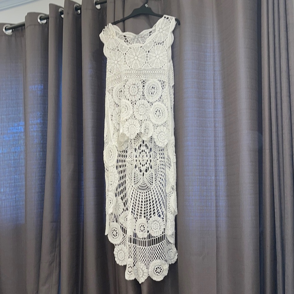 Cream coloured crochet coverup. One size but I would say fits small to medium